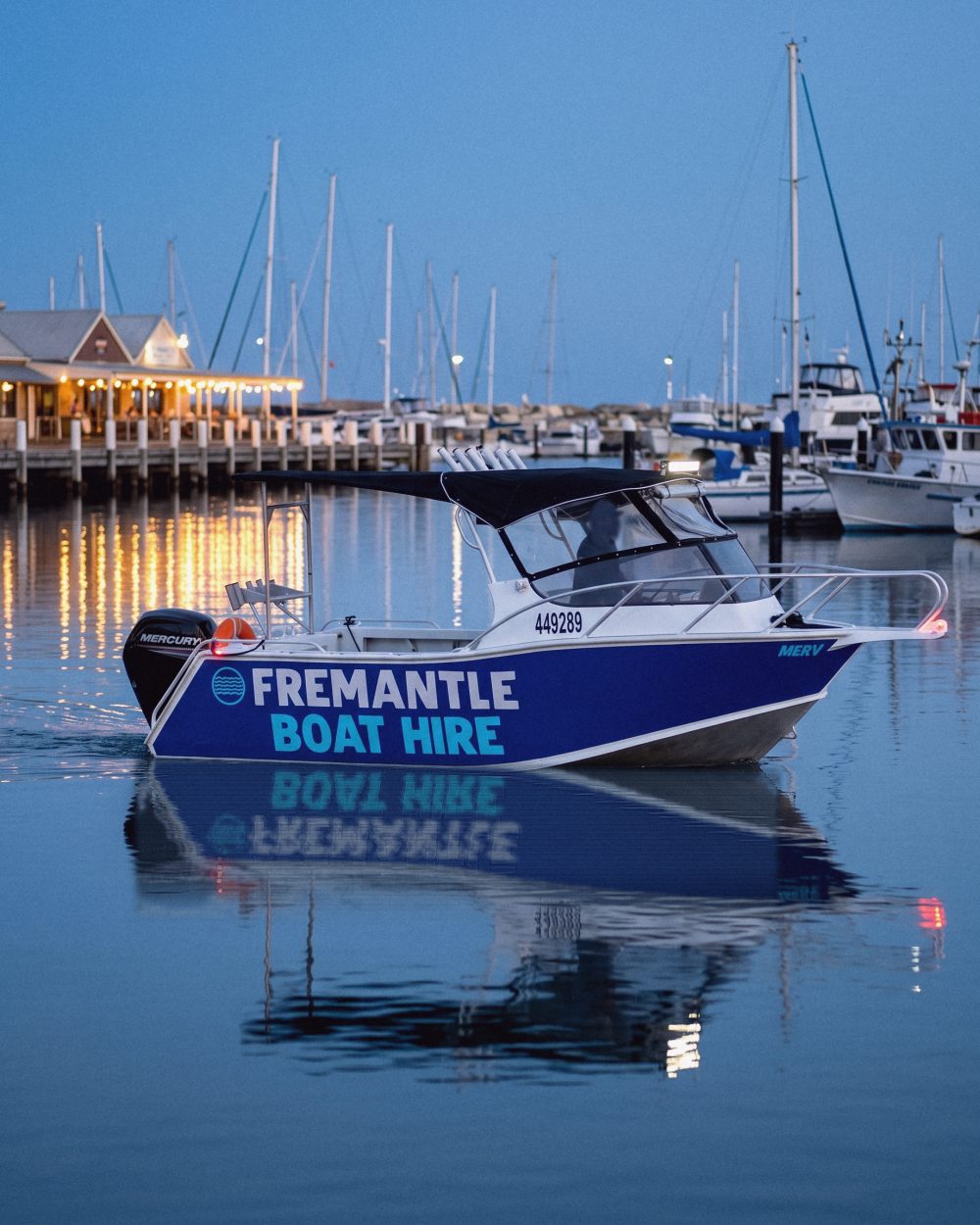 Merv idling out of Fremantle Fishing Boat Harbour at dusk
