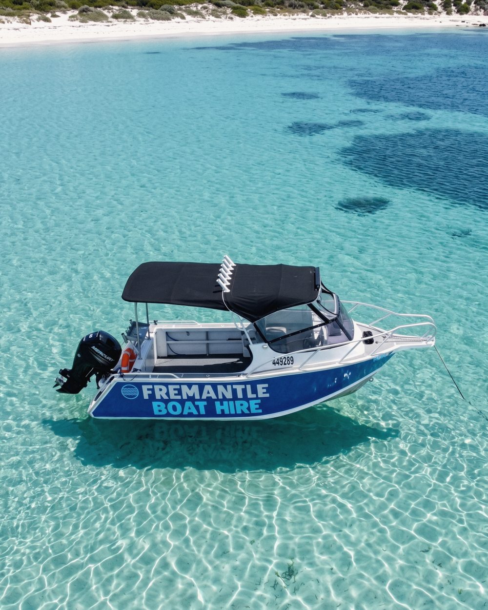 Merv anchored over white sand and turquoise water at Rottnest Island